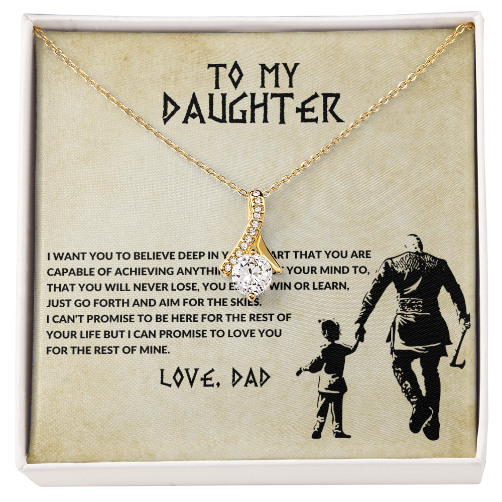 Gold-tone chain pendant necklace with crystal heart and bow-shaped center charm