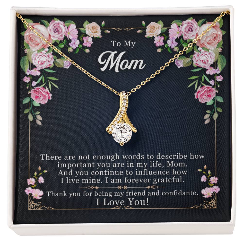 Gold-tone mom pendant necklace displayed in floral gift box