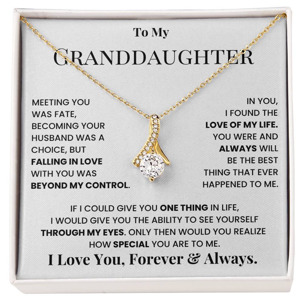 Gold-tone teardrop crystal pendant necklace on message card inside gift box
