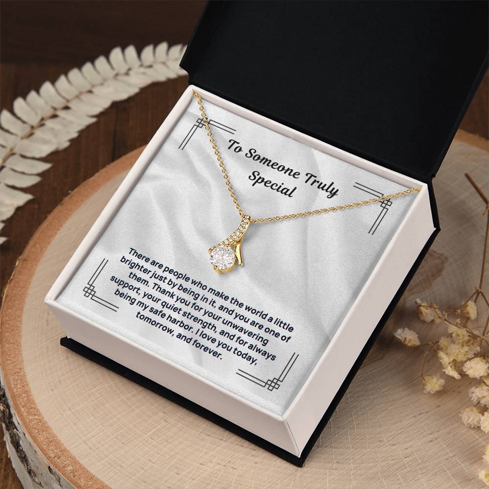 Gold tone pendant necklace with “To Someone Truly Special” card in open gift box