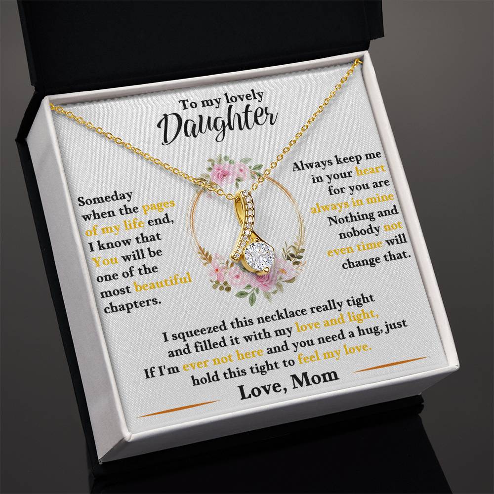 Gold-tone daughter keepsake necklace in black gift box with floral heart charm pendant