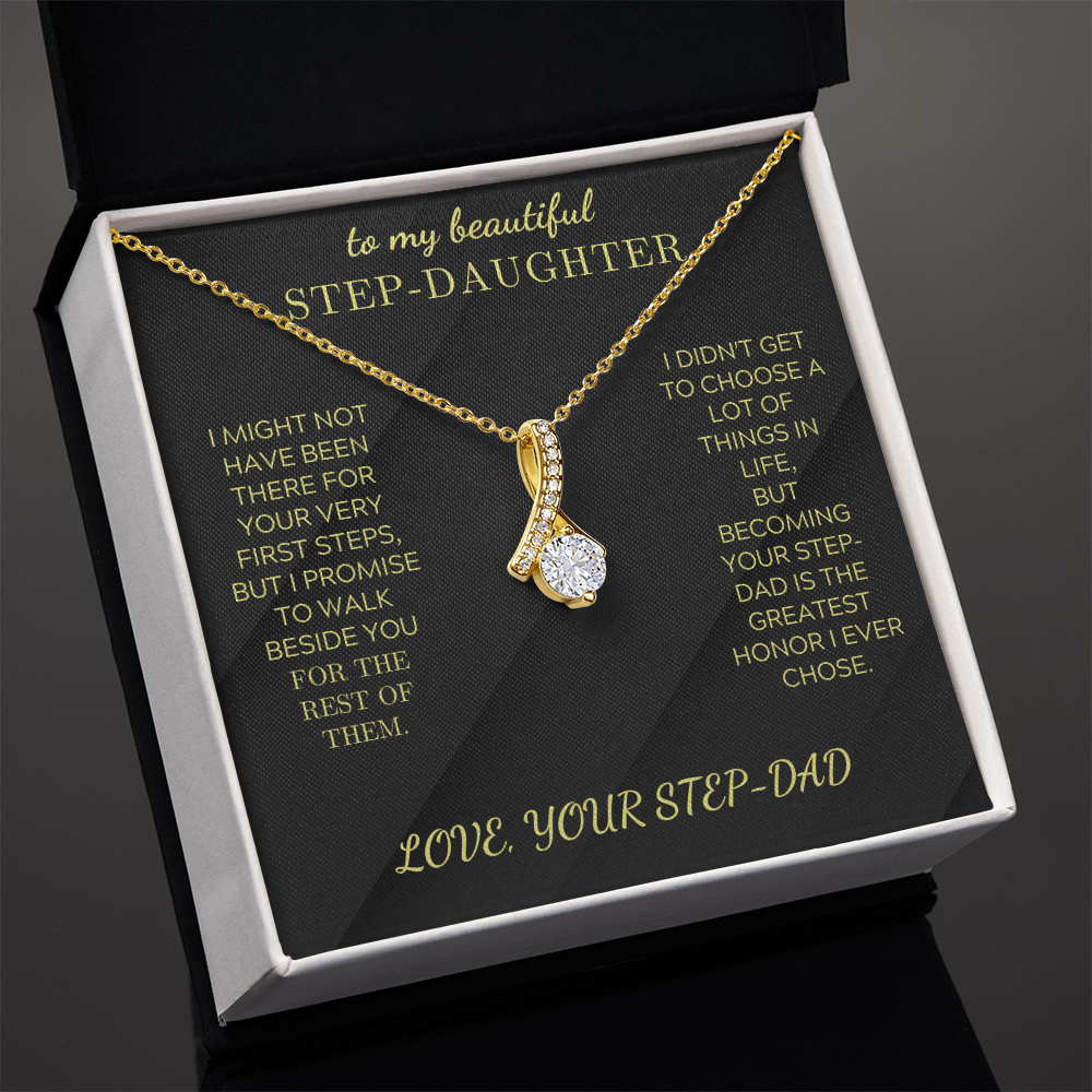 Gold-tone necklace with teardrop crystal pendant and chain, in gift box display.