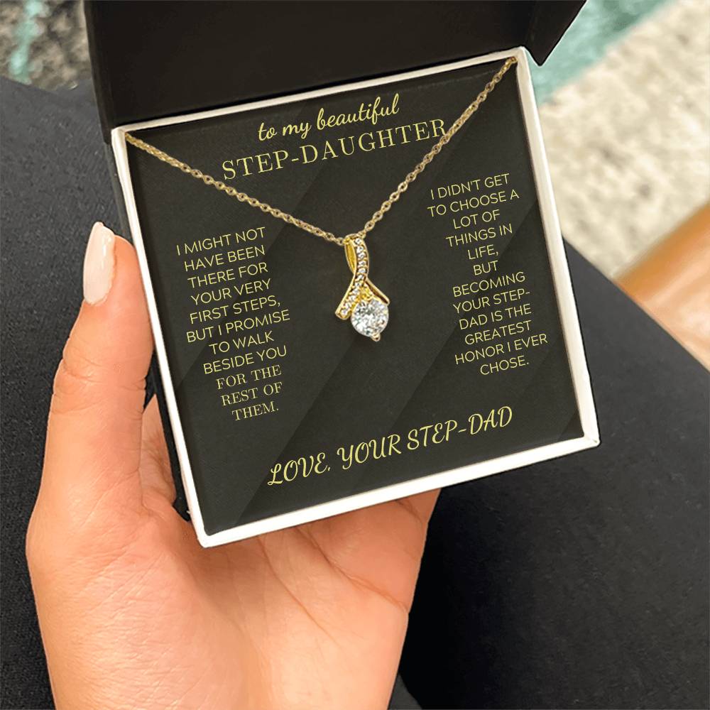 Gold-tone necklace with teardrop crystal charm in gift box display