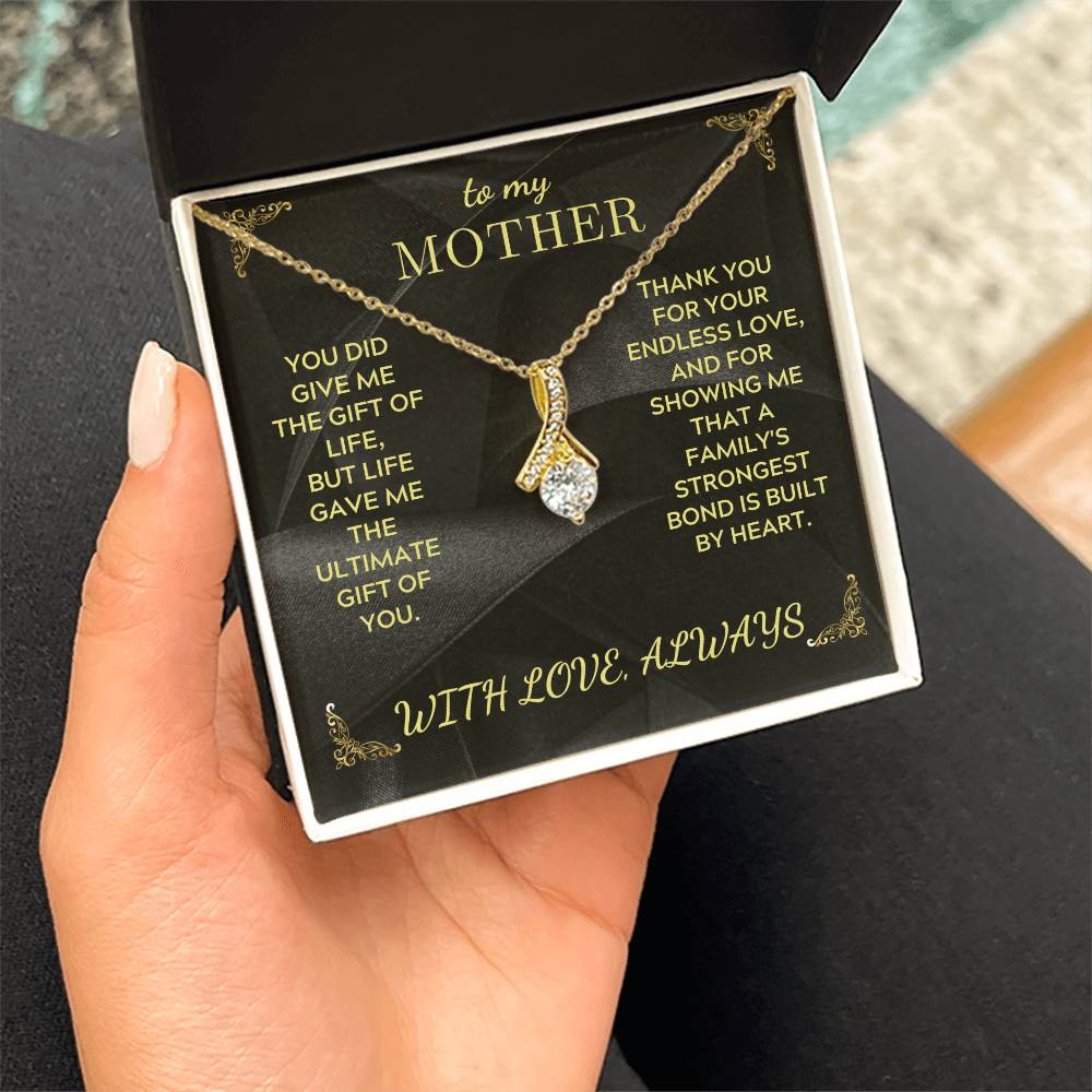 Mother necklace in gift box, gold chain with teardrop heart charm pendant on black insert