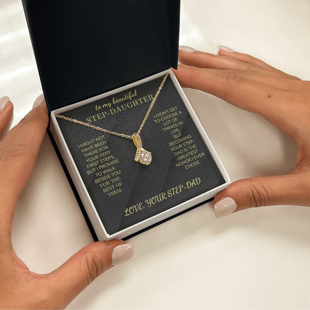 Gold-tone pendant necklace with round stone drop charm in open gift box