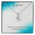 Silver-tone heart teardrop pendant necklace in a gift box with chain and clasp.