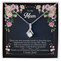 Silver-tone mom pendant necklace displayed in floral gift box
