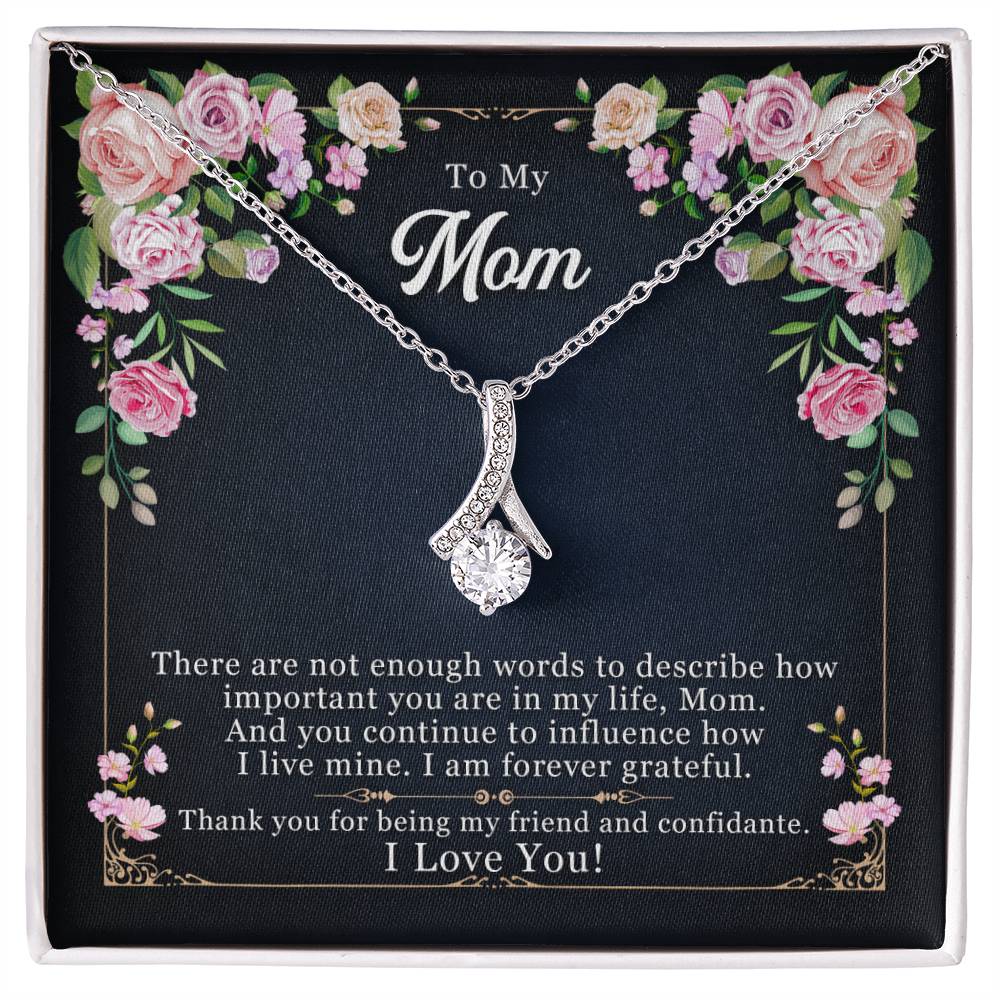 Silver-tone mom pendant necklace displayed in floral gift box