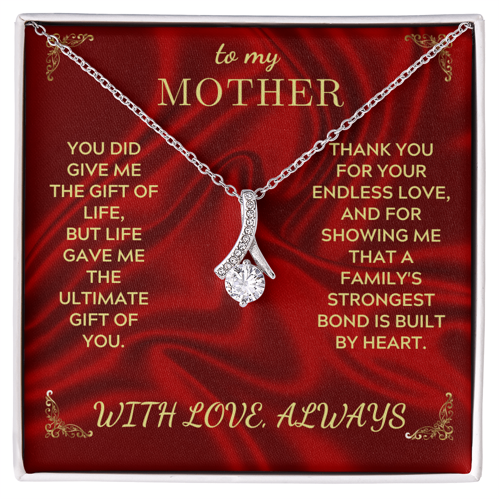 Silver-tone necklace with teardrop crystal heart pendant in red gift box
