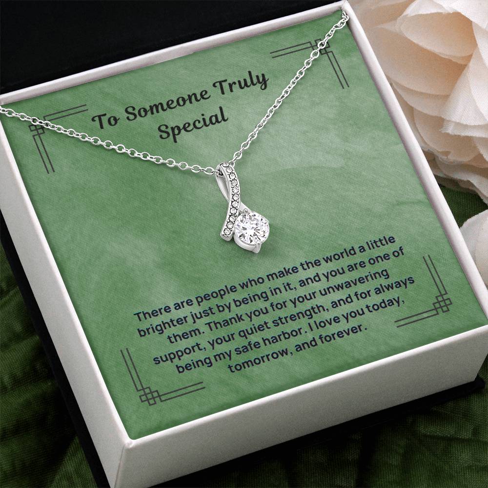 Silver-tone teardrop pendant necklace in a green gift box