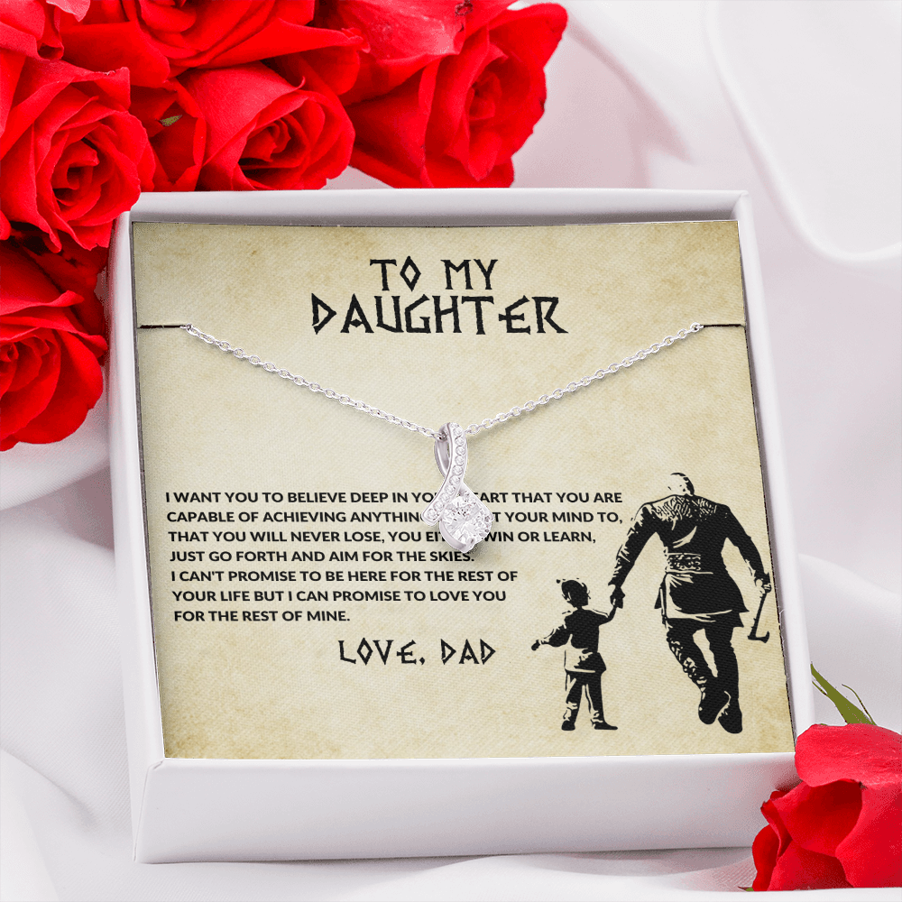 Silver-tone chain necklace with round crystal heart pendant and small bow accents