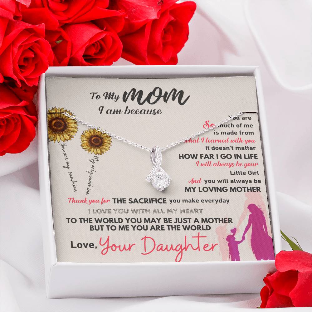 Silver-tone necklace with teardrop pendant in white gift box with “To My Mom” card