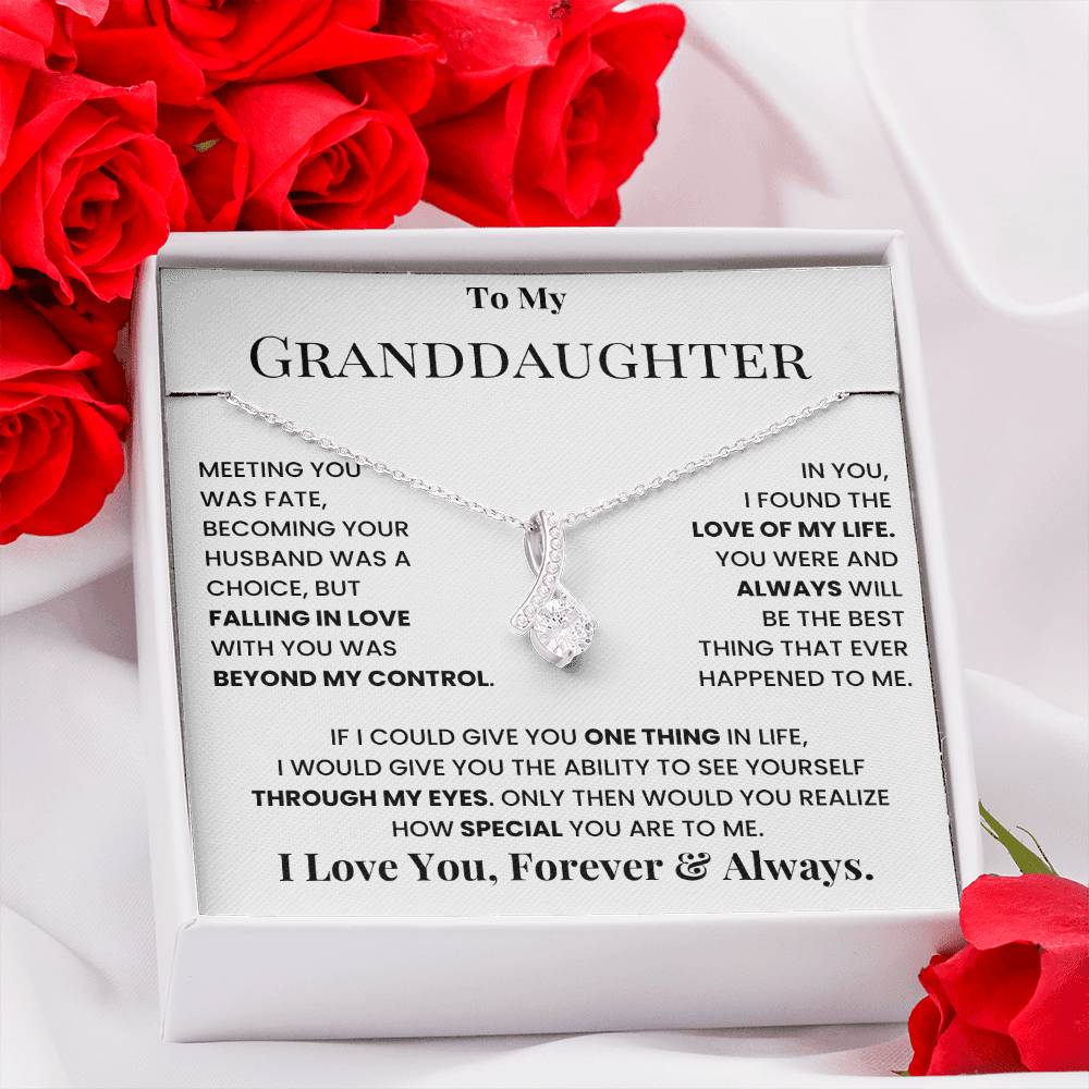 Silver-tone necklace with teardrop crystal pendant on message card in gift box