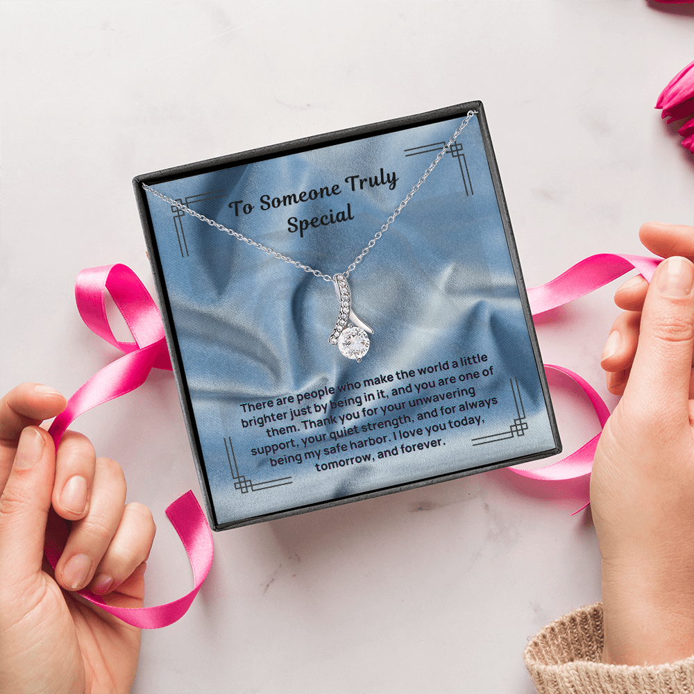 Silver teardrop pendant necklace on a fine chain, shown in gift box