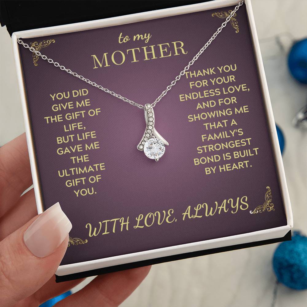 Purple gift box with silver-tone heart pendant necklace and chain for Mother message