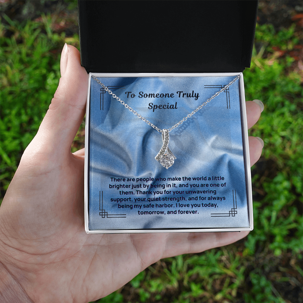 Silver teardrop pendant necklace with pave stones and a delicate chain