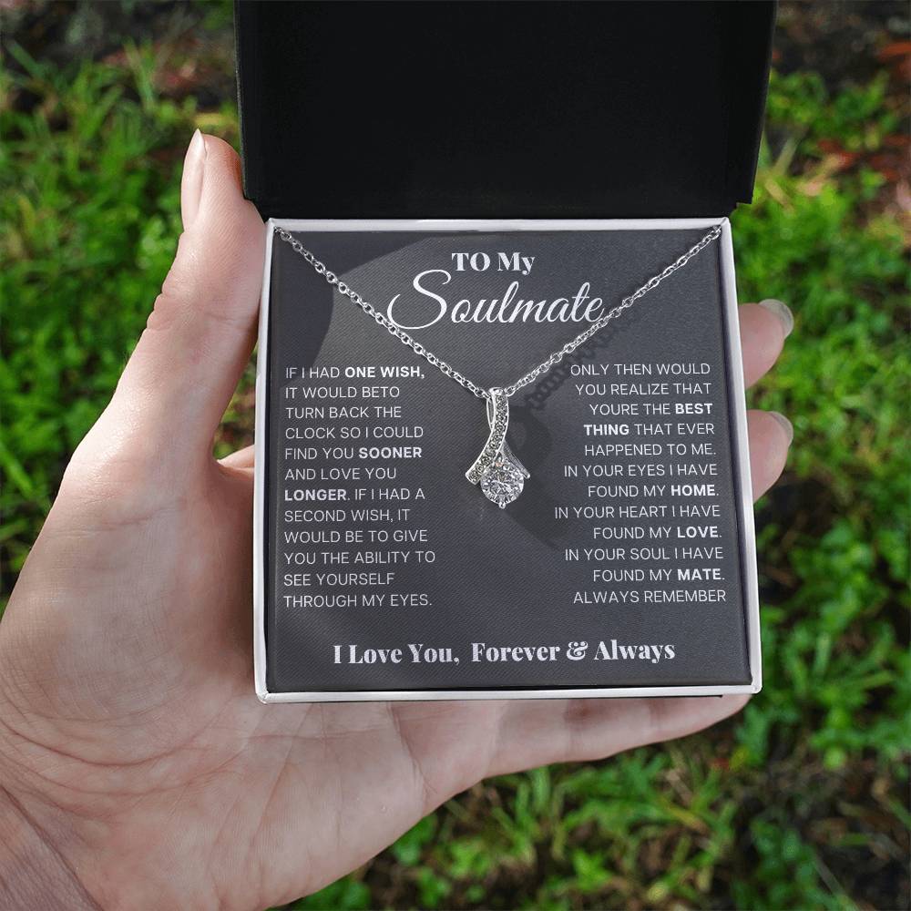 Silver-tone teardrop pendant necklace shown in gift box