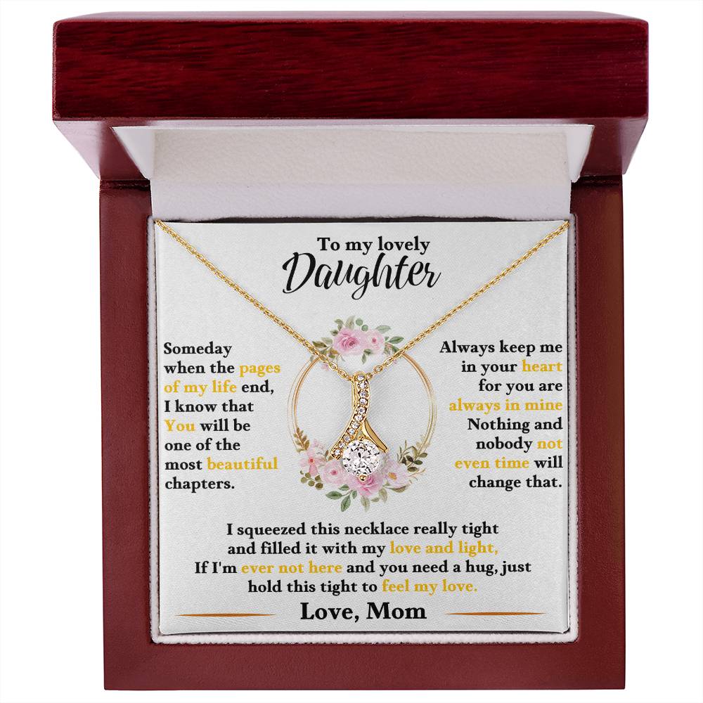 Gold-tone daughter keepsake necklace in red gift box with floral heart charm pendant