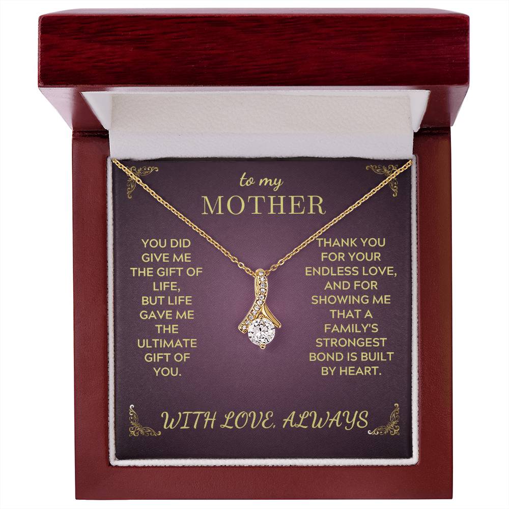 Gold-tone teardrop heart pendant necklace in red jewelry gift box with chain