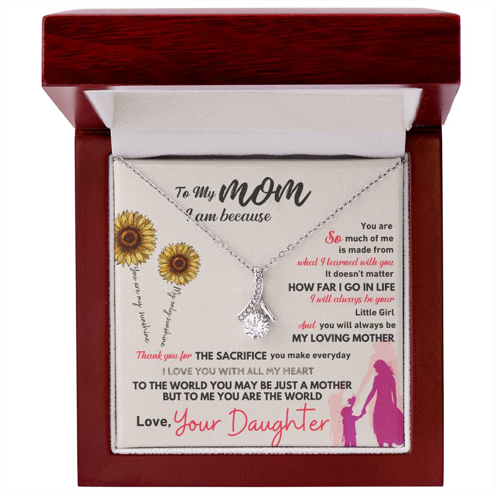 Silver-tone necklace with teardrop pendant in red wooden gift box
