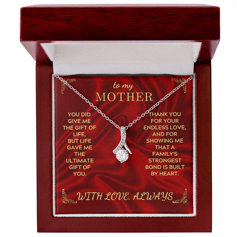 Silver-tone necklace with teardrop crystal heart pendant in red wooden-style gift box