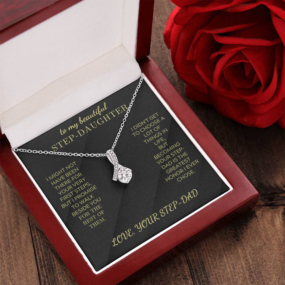 Silver-tone pendant necklace with teardrop cluster charm displayed in open gift box