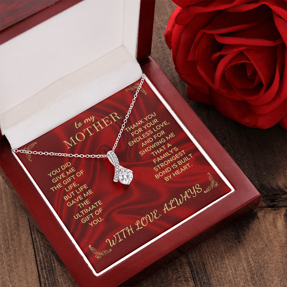 Necklace gift set with silver chain and teardrop heart pendant inside red box