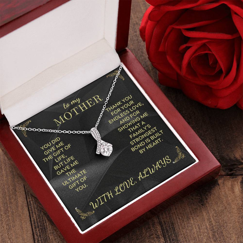 Mother necklace in red gift box, silver chain with teardrop heart charm pendant on black insert