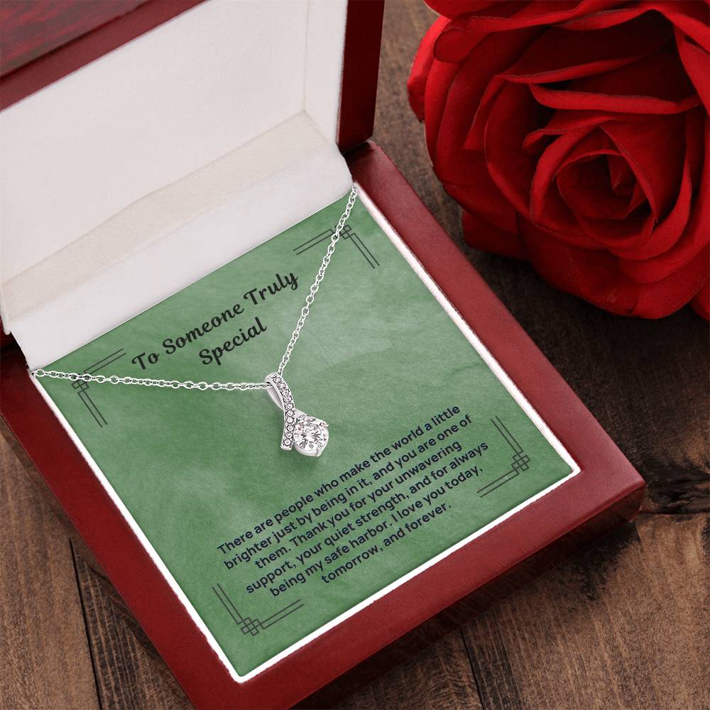Silver-tone teardrop pendant necklace in a red gift box