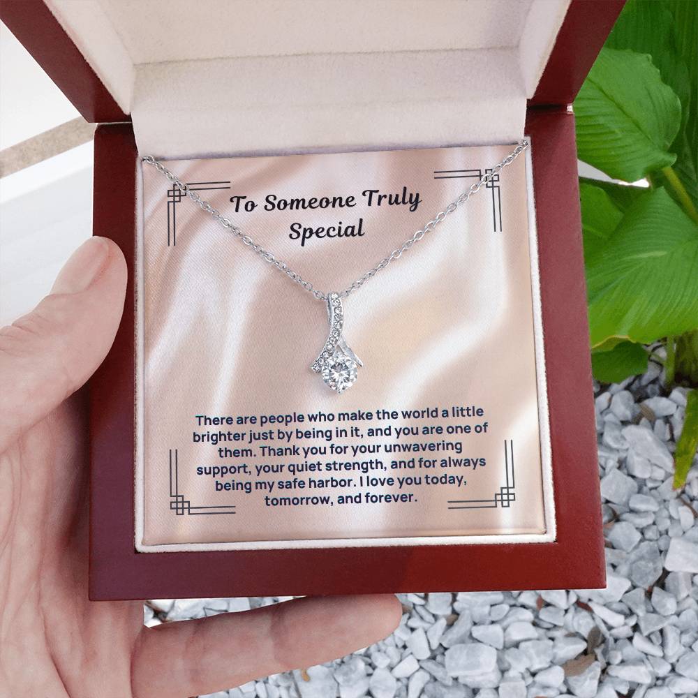 Silver-tone “To Someone Truly Special” necklace in open red gift box