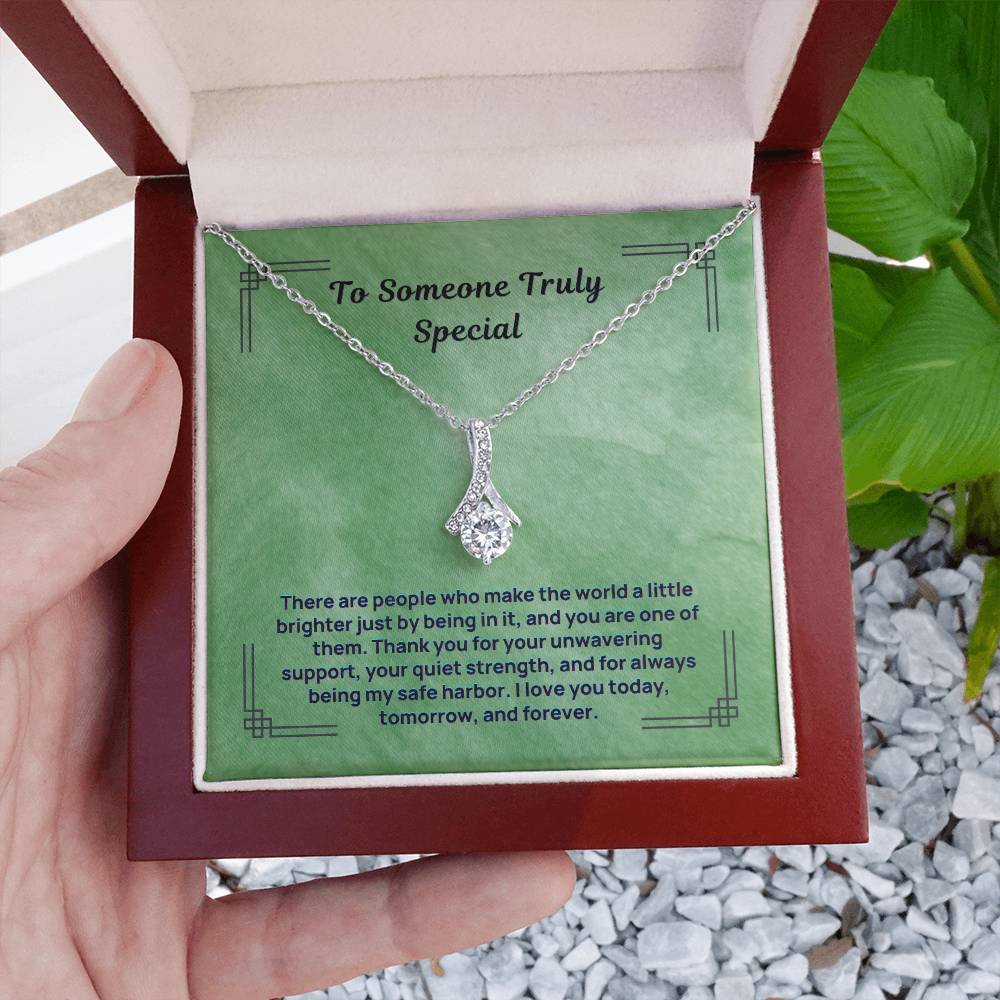 Silver-tone teardrop pendant necklace in a red gift box
