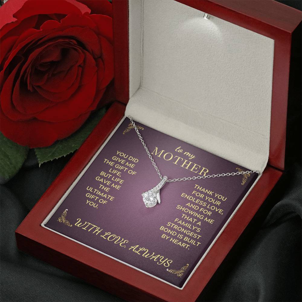 Silver-tone pendant necklace in a purple gift box with “with love always” wording