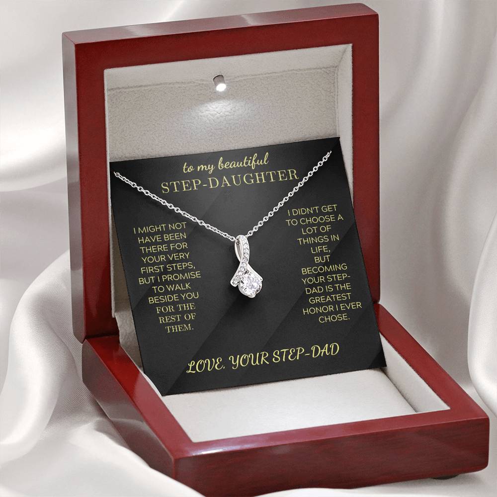 Silver-tone pendant necklace with teardrop cluster charm inside red gift box