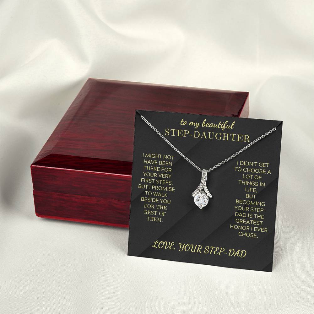 Silver-tone pendant necklace with teardrop cluster charm on black card with red box