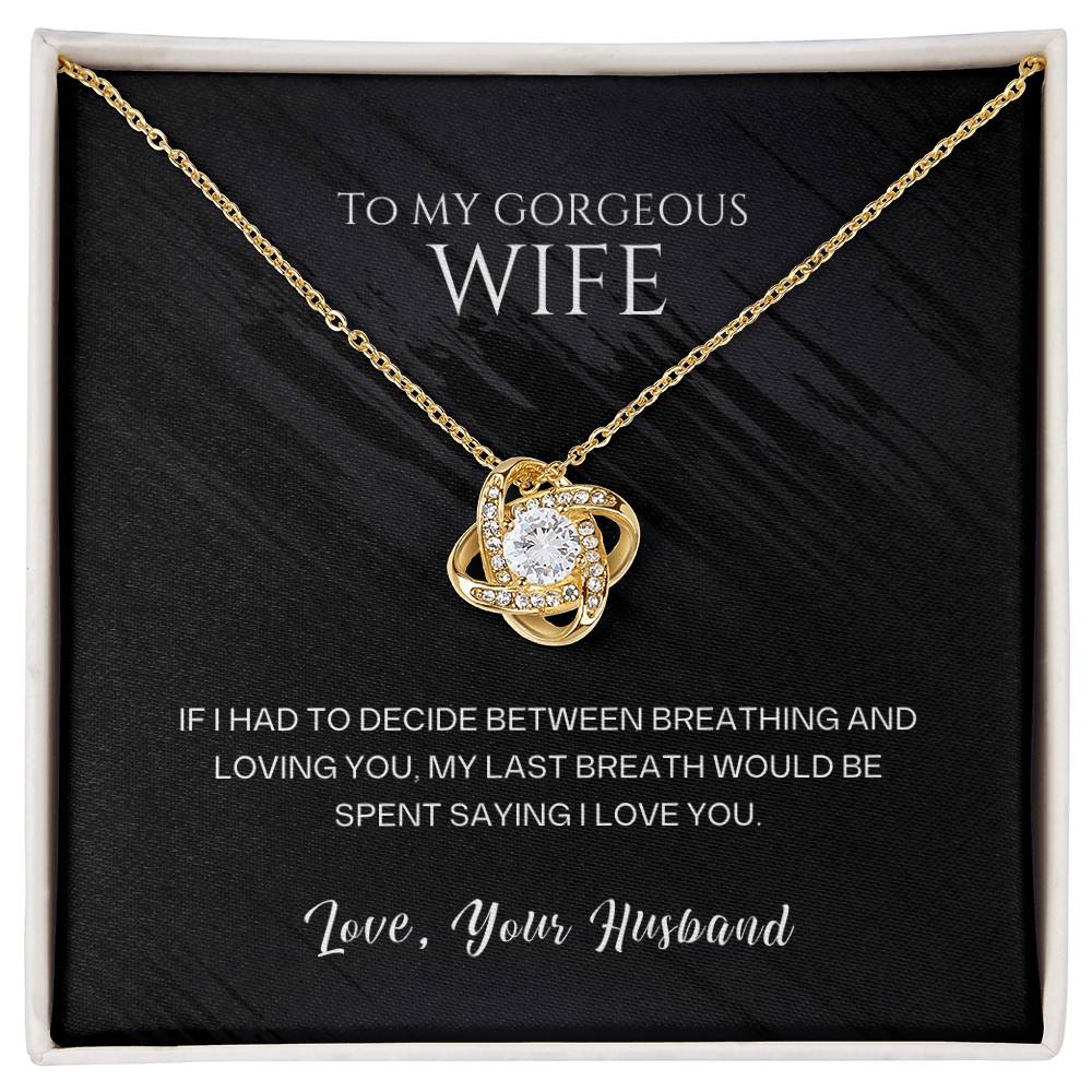 Gold-tone heart pendant necklace with round stones in a gift box