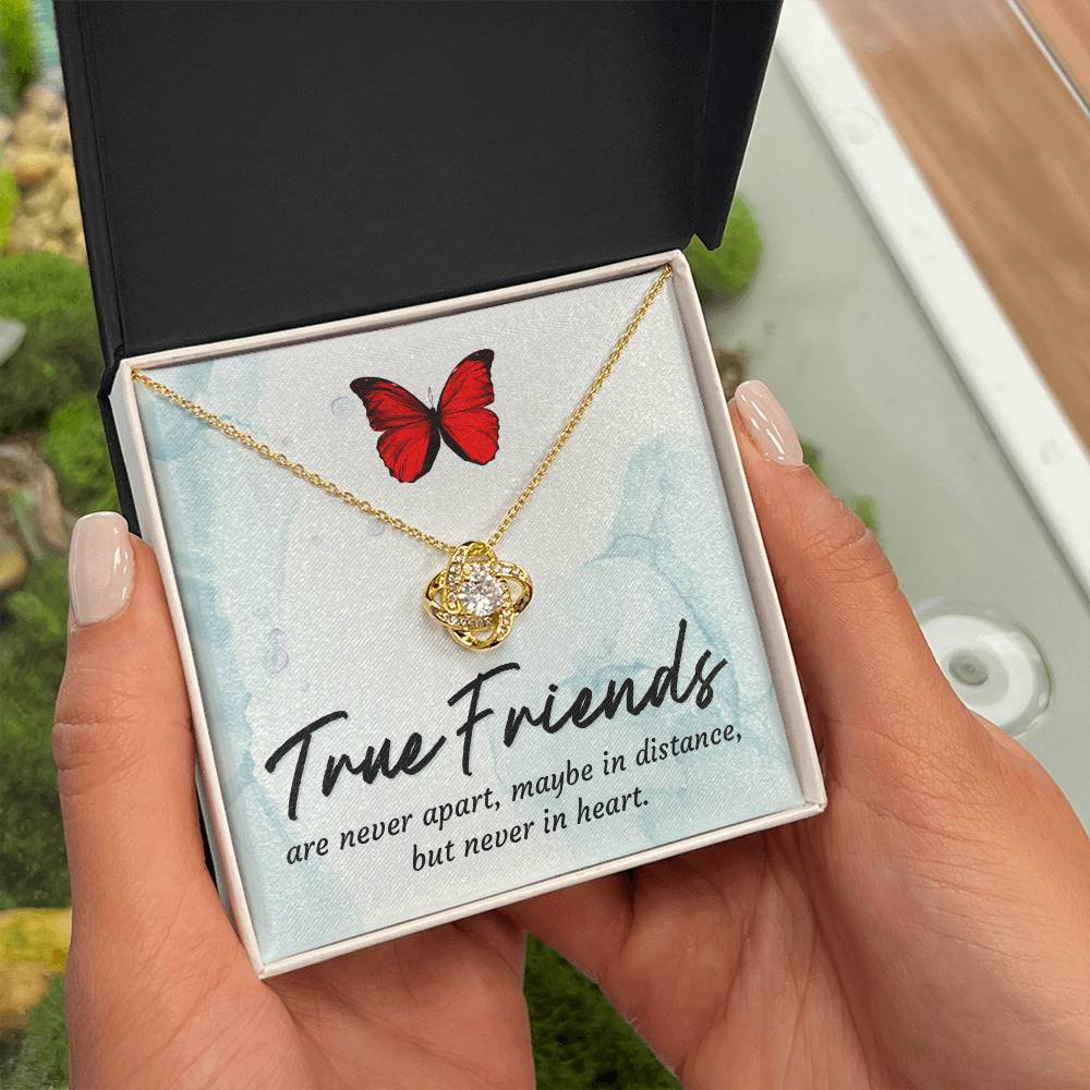 Gold love knot necklace with red butterfly pendant in gift box