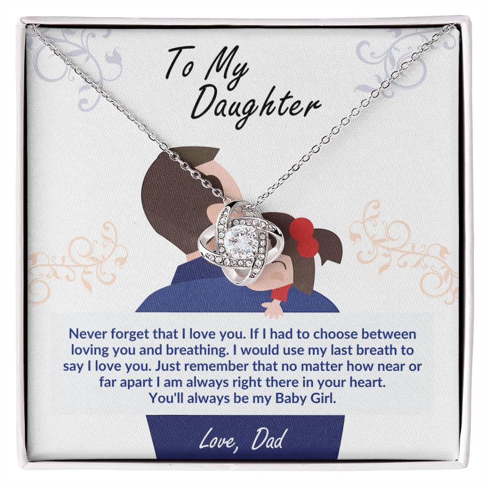 Silver heart pendant necklace with rosette charm, flat view inside gift box