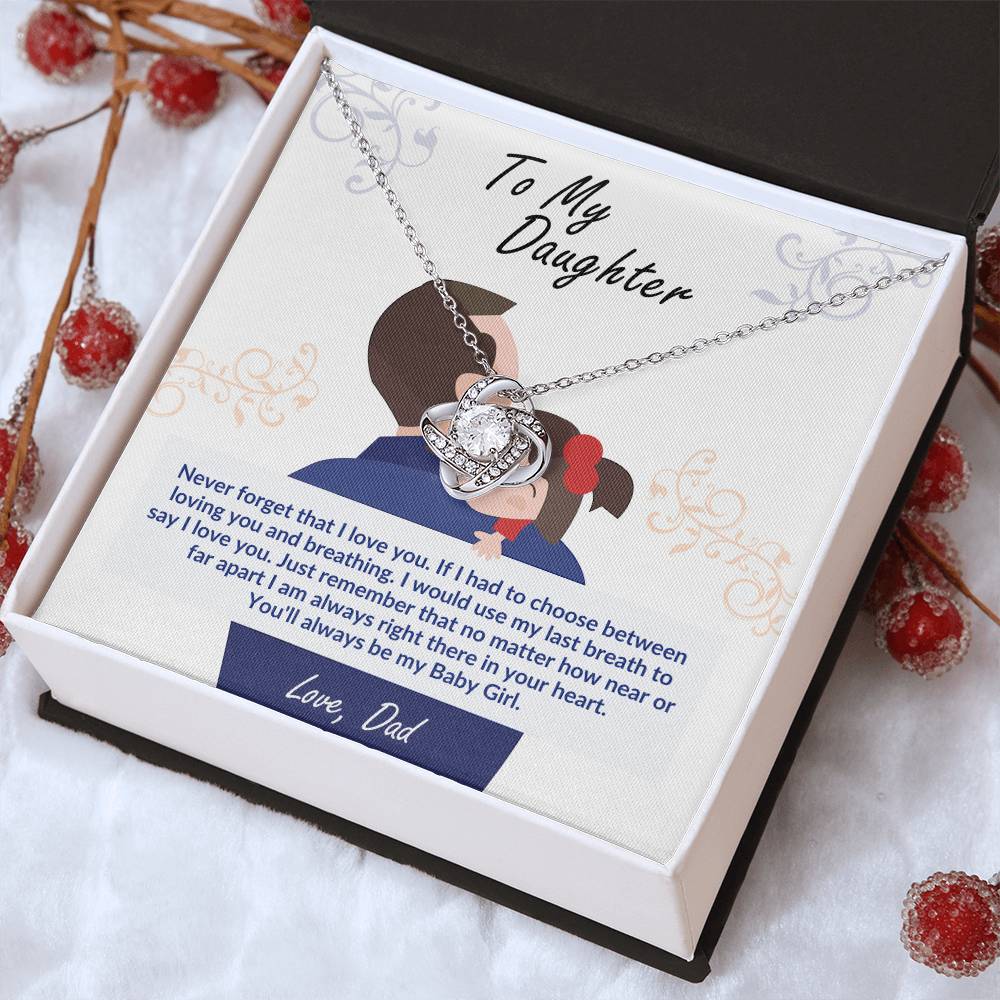 Silver heart pendant necklace with rosette charm, chain shown in gift box