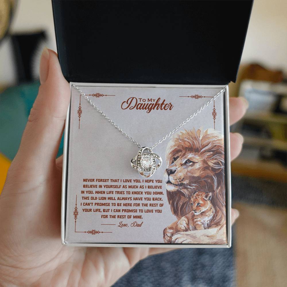 Silver-tone daughter promise necklace with round heart pendant, gift box on hands