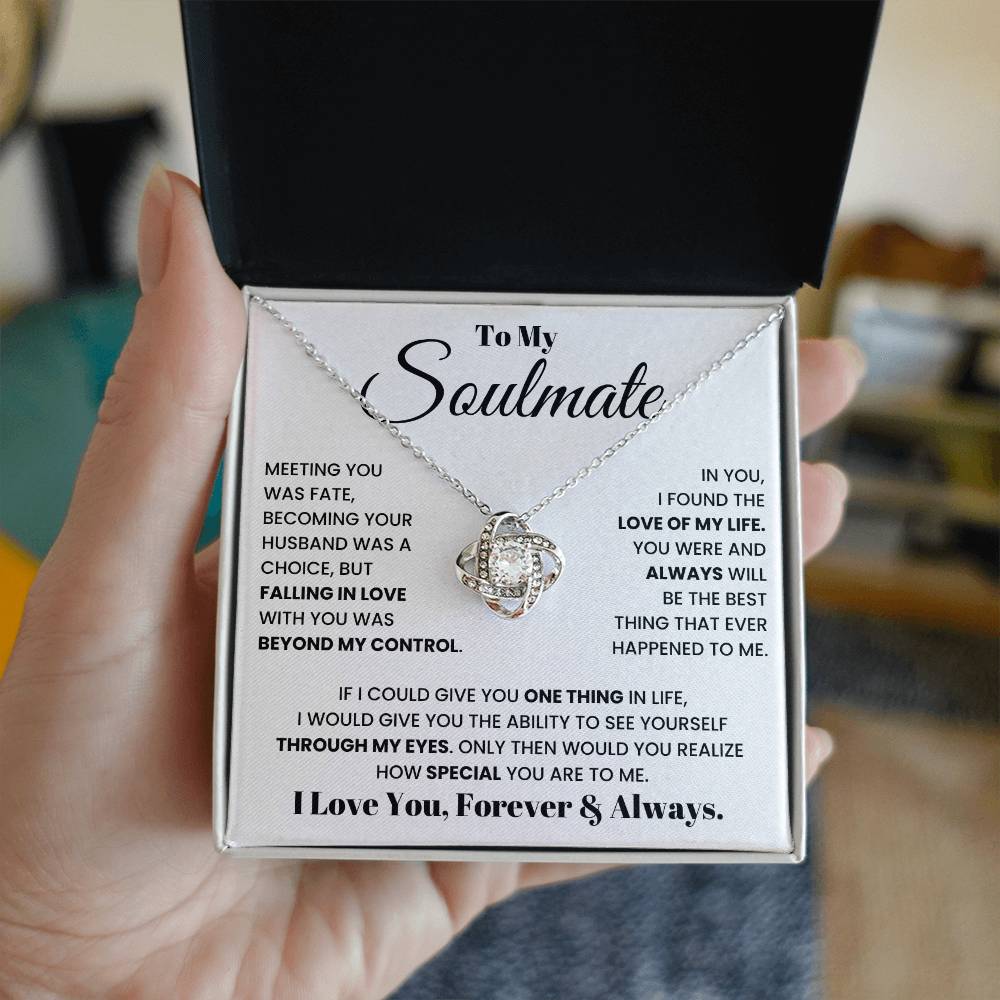 Soulmate heart pendant necklace with silver chain, gift box held in hand.