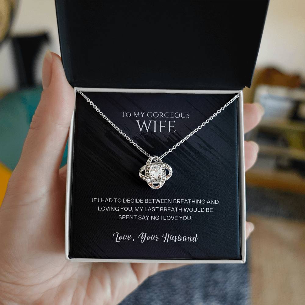 Silver-tone pendant necklace with round bezel stones on chain, shown in gift box