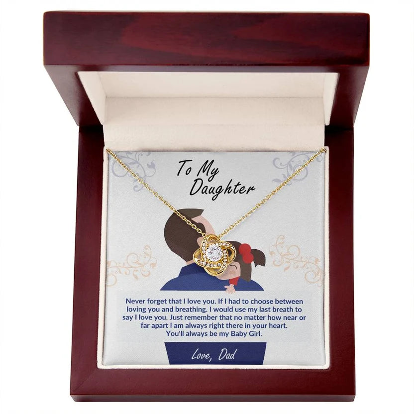 Gold heart pendant necklace with rosette charm in dark red presentation box