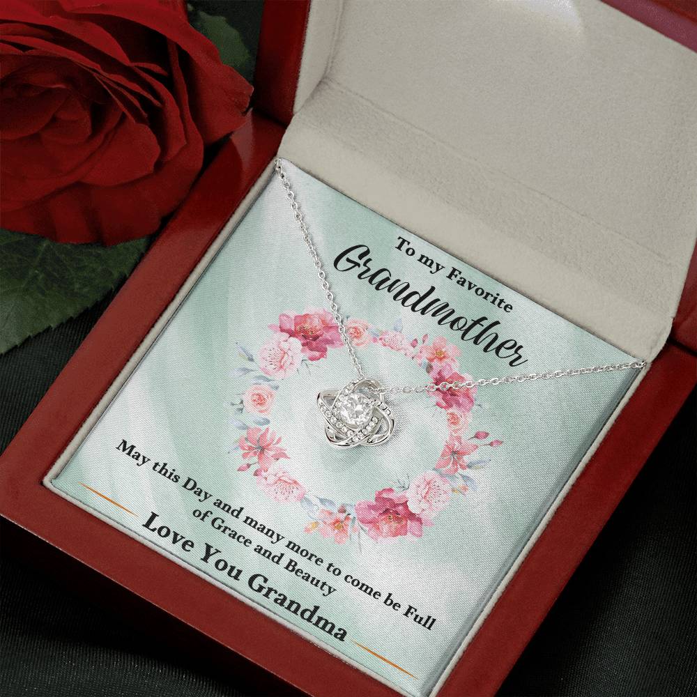 Silver love-knot heart pendant necklace with chain in a gift presentation box
