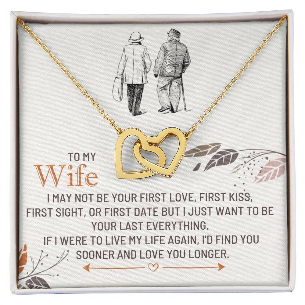 Gold-toned heart pendant necklace in a gift box with printed message and figures