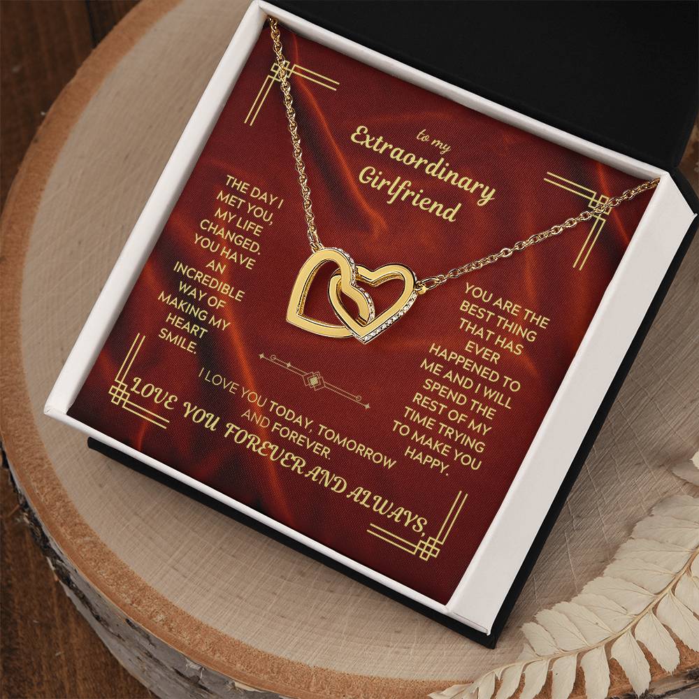 Interlocking hearts necklace with heart-shaped pendant and linked chain