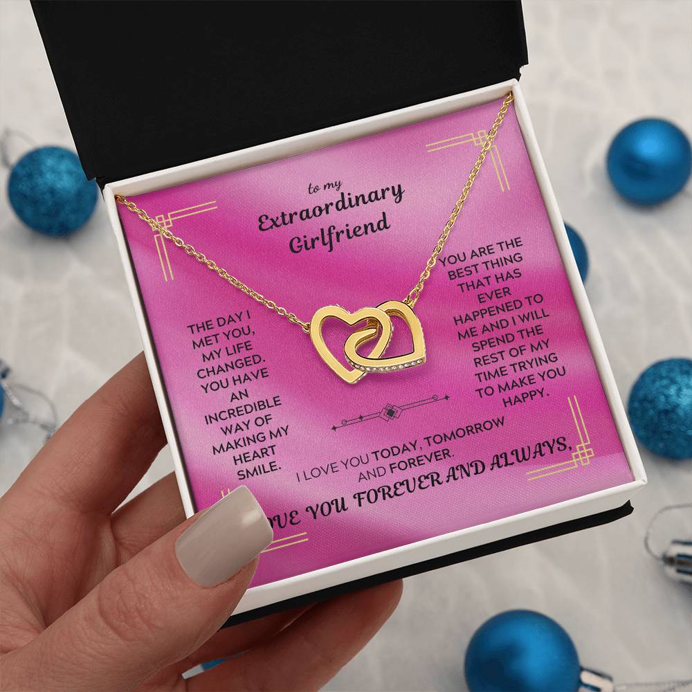Gold and rose interlocking hearts pendant necklace in a gift box