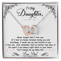 Silver-tone heart pendant necklace with two-tone heart charm in a white gift box