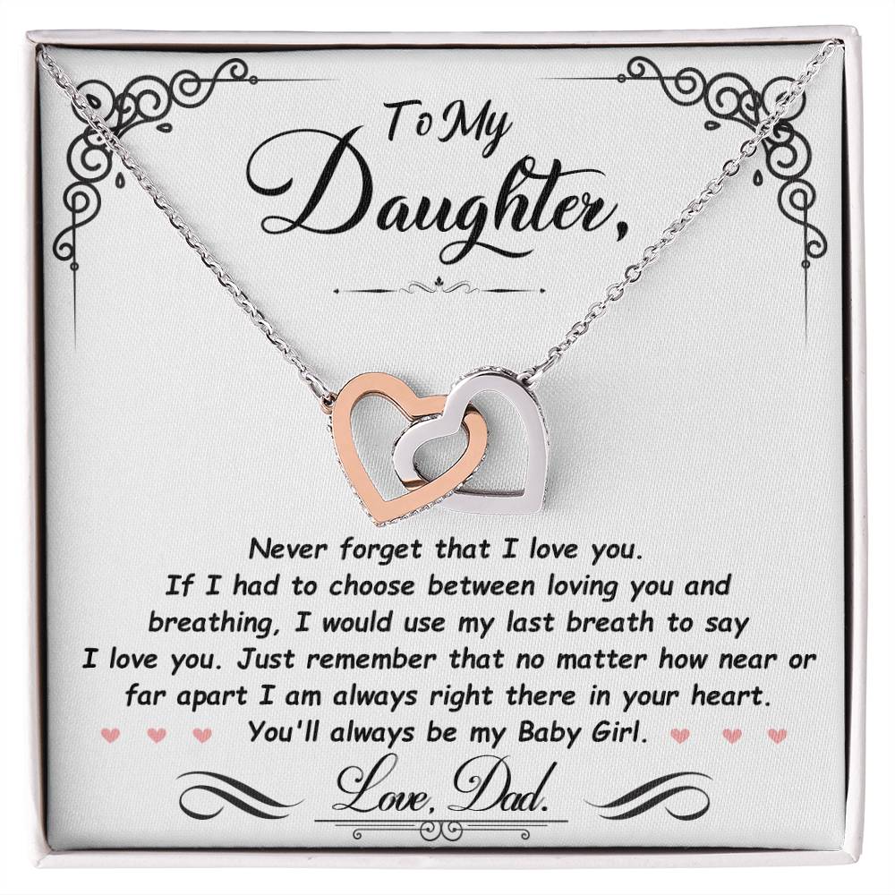 Silver-tone heart pendant necklace with two-tone heart charm in a white gift box