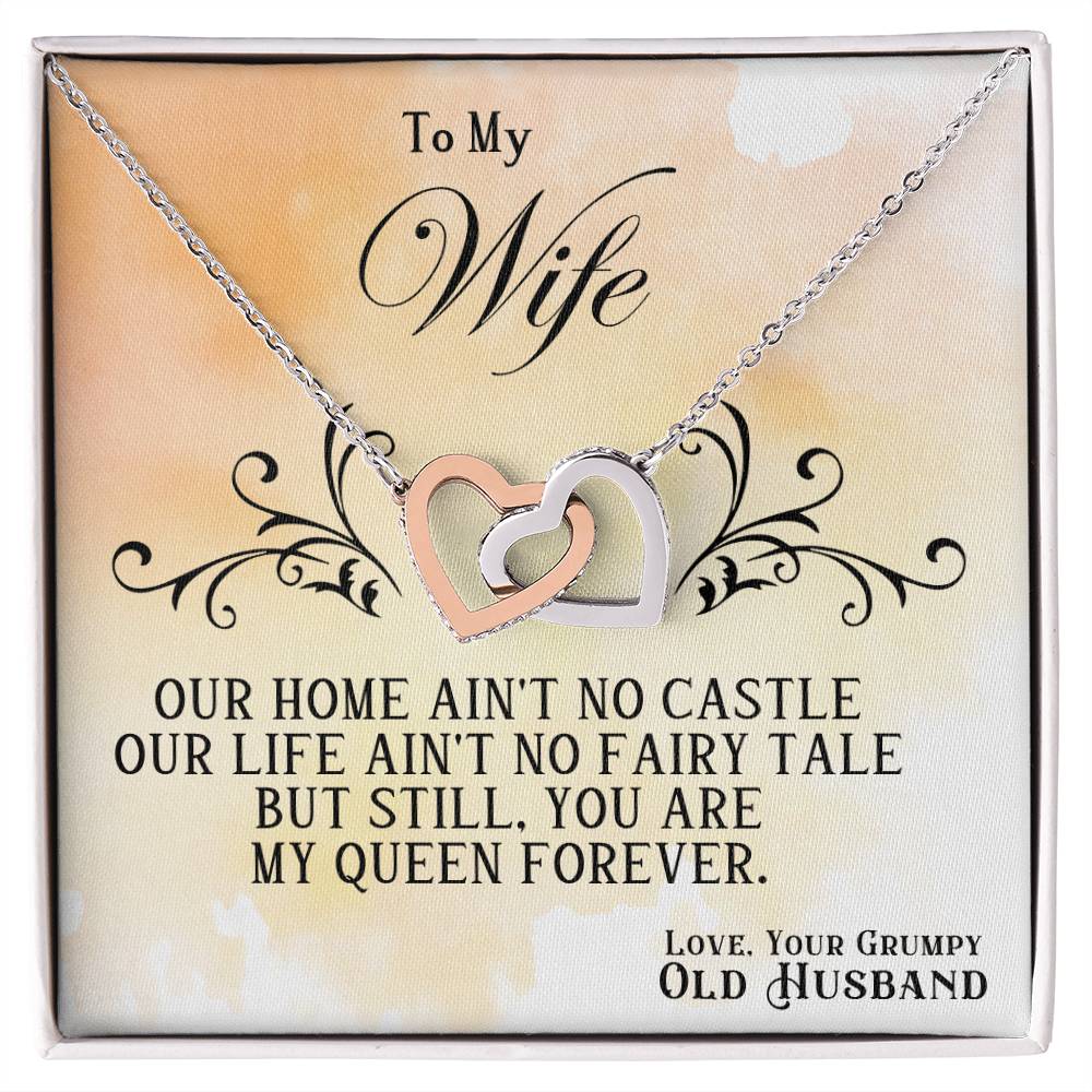 Heart pendant necklace with rose-and-silver hearts in an open gift box for wife
