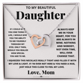 Daughter heart necklace in silver-tone with heart pendant inside a gift box.